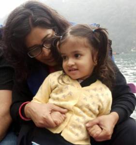 Priya with their beautiful daughter, Bela - taken in the Himalayan foothills; home of her in-laws. 